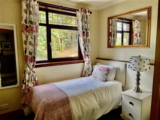 Ground floor bedroom with fully adjustable electric single bed